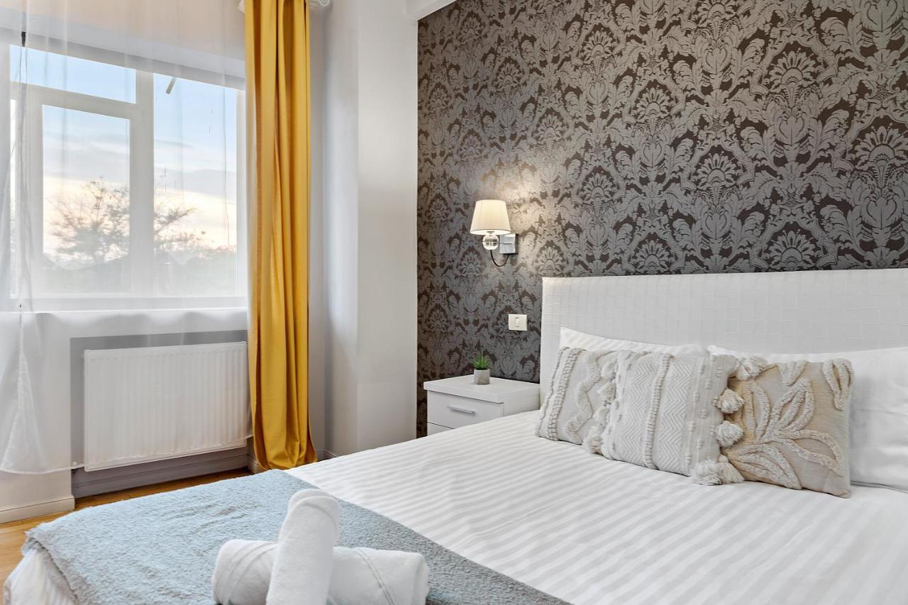City Heart Retreat Elegant Apartment บูคาเรสต์ ภายนอก รูปภาพ