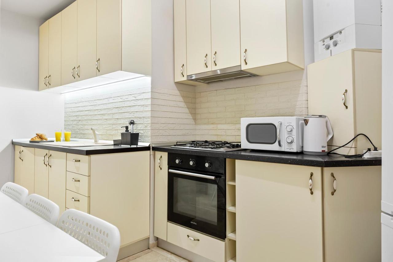 City Heart Retreat Elegant Apartment บูคาเรสต์ ภายนอก รูปภาพ